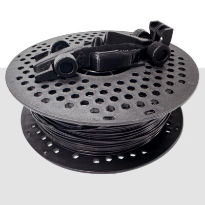 Black cable reel with holes and a coiled cable.