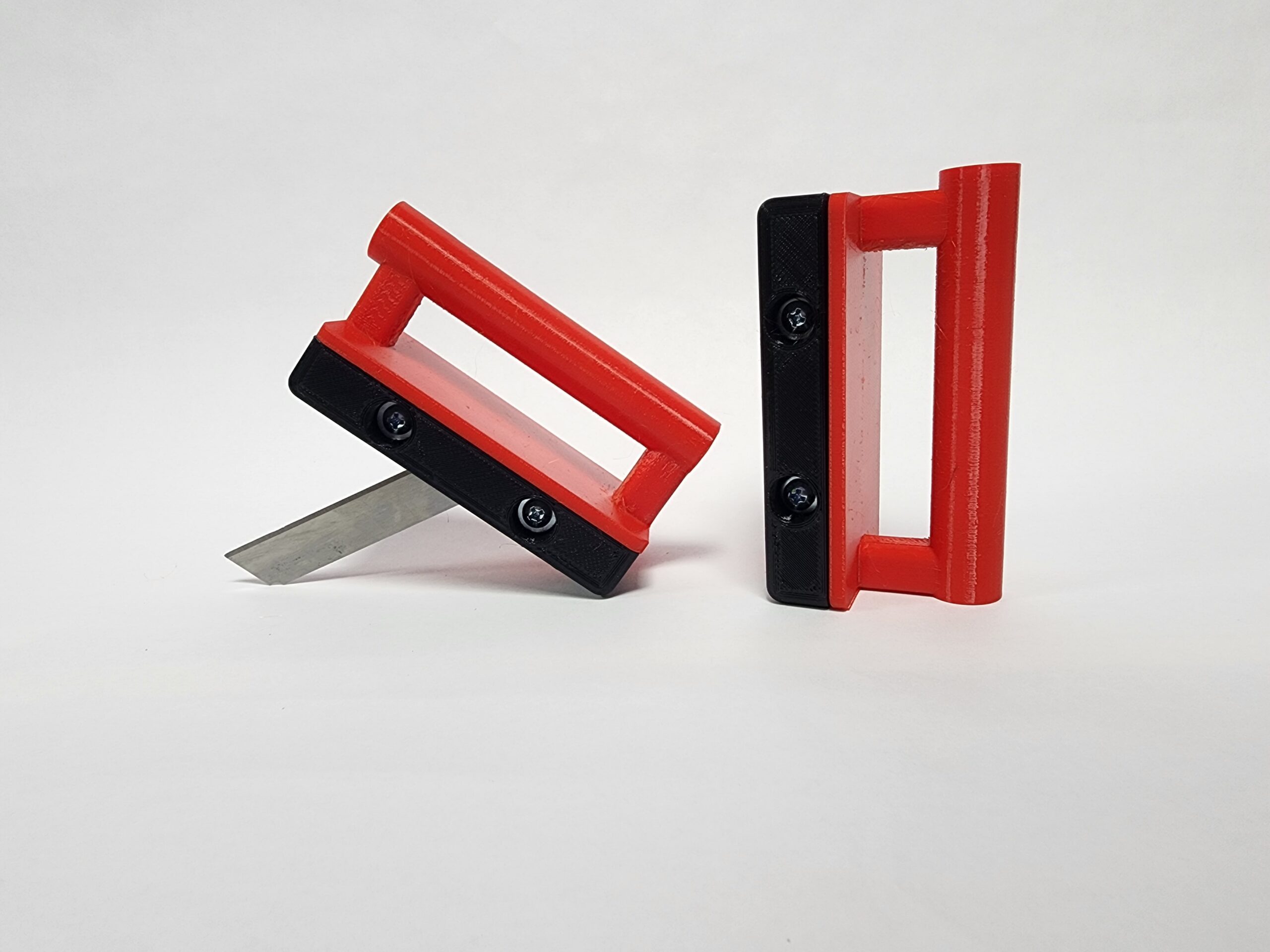 Red and black utility knife holders.